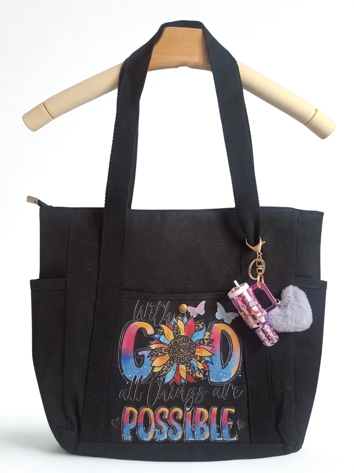 Bolso de lona con multiples bolsillos y llavero Mini Tumbler.