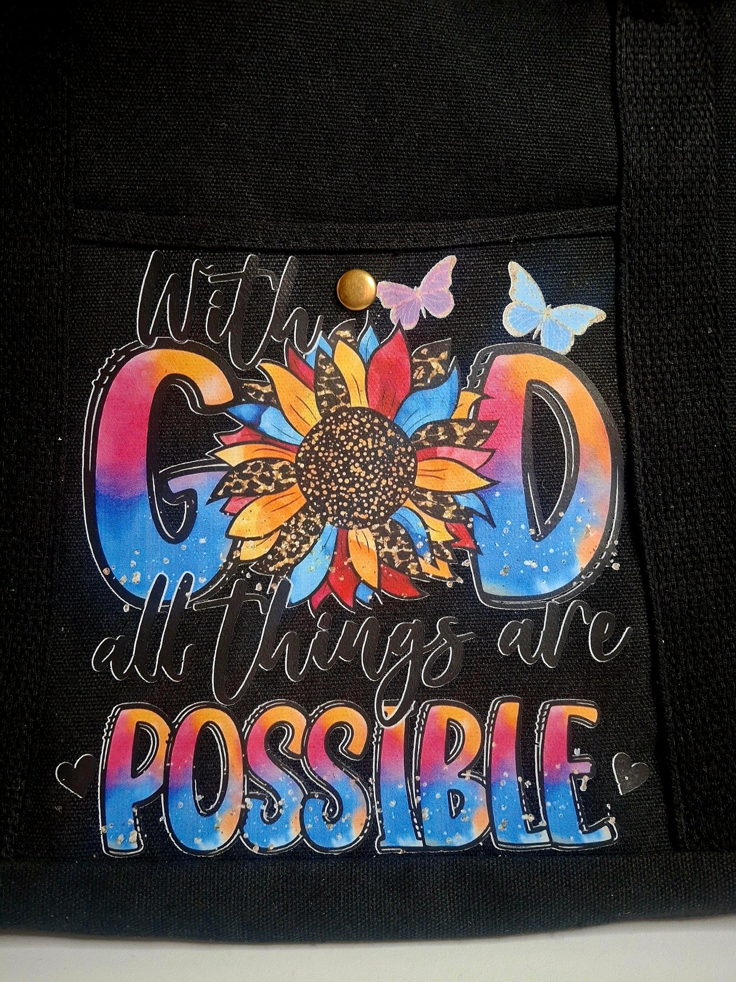 Bolso de lona con multiples bolsillos y llavero Mini Tumbler.