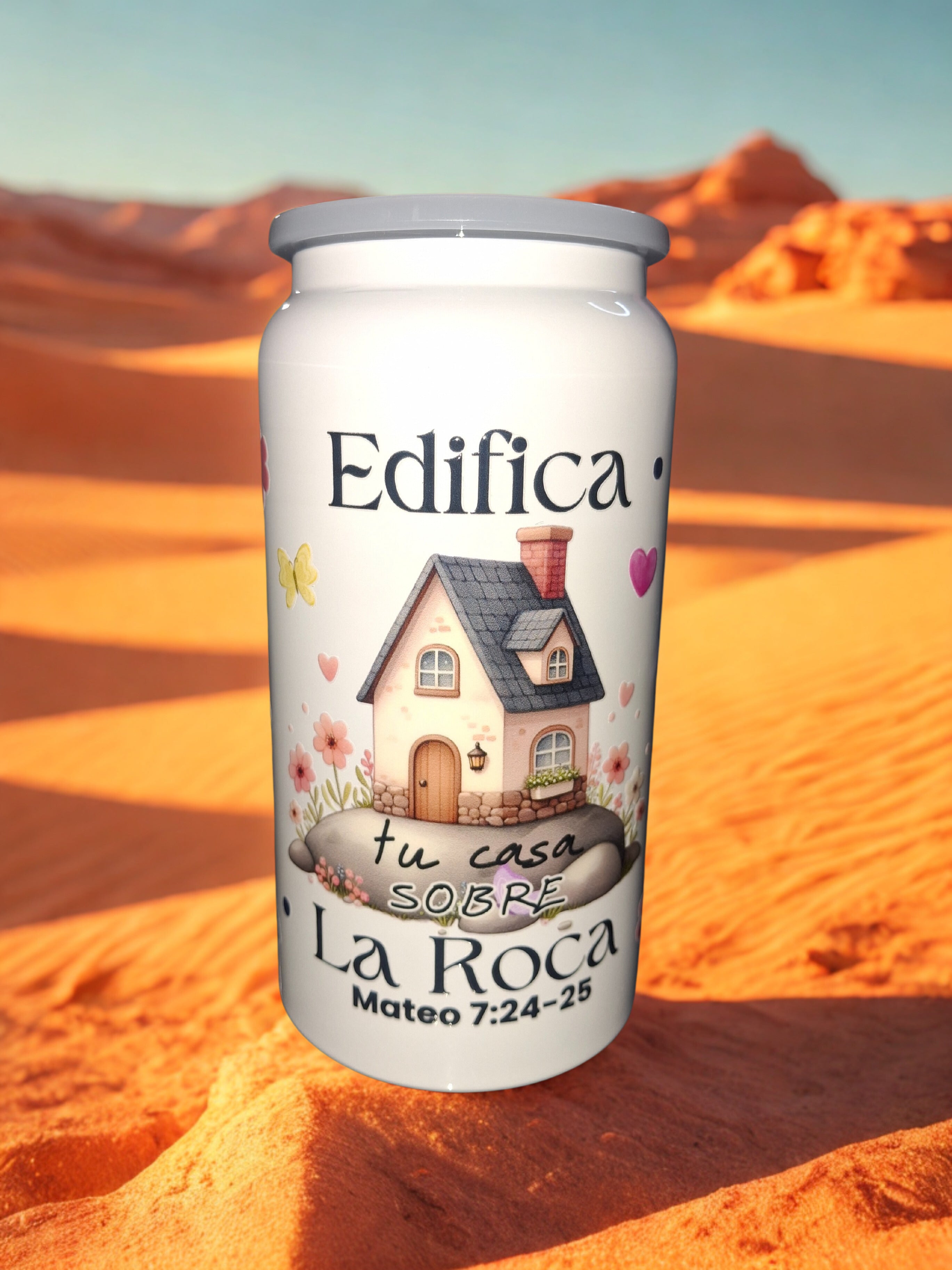 Vaso color blanco de 16 onzas,de acero inoxidablecon estampado "EDIFICA TU CASA SOBRE LA ROCA".    16 ounce cup of stainless steel with " Edifica tu casa sobre la roca"stamp.